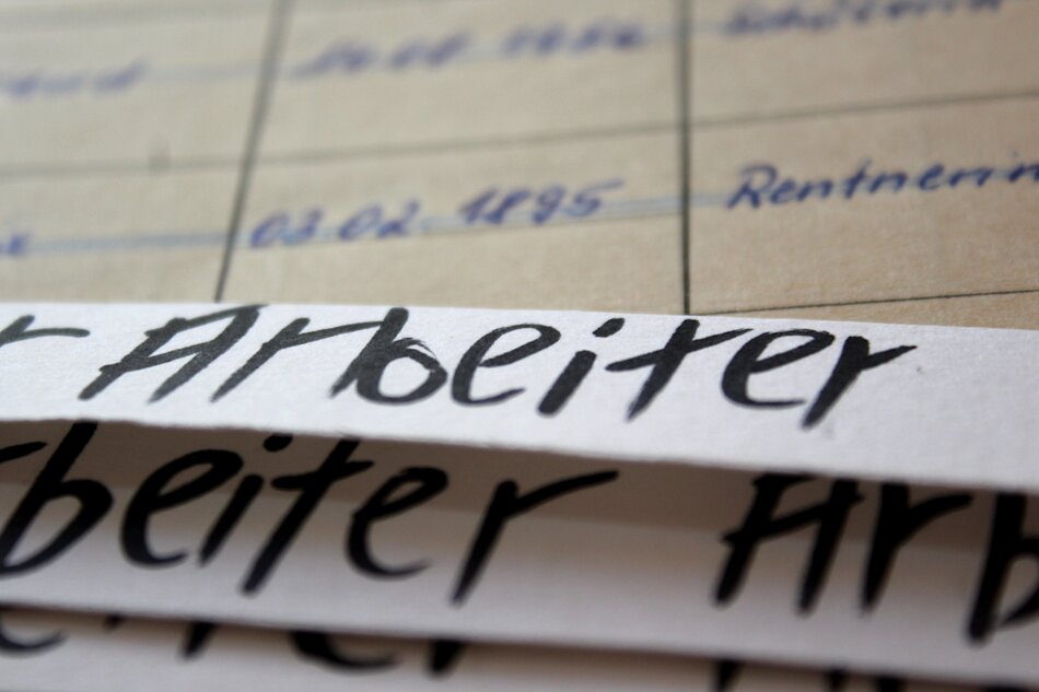   Close-up of old paper with handwritten German text, from a historical document.